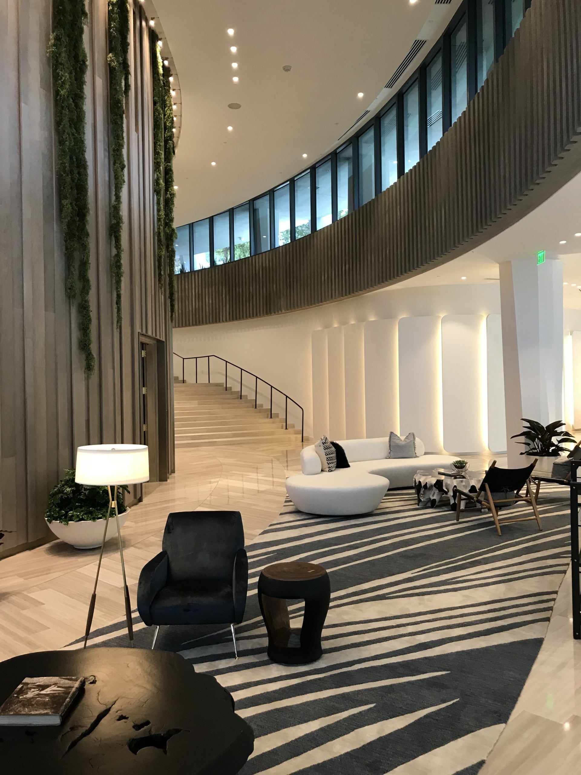 lobby living room and staircase at Park Grove Club Residences lobby living room and staircase at Park Grove Club Residences