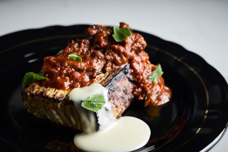 Fire-roasted lasagna with maitake bolognese, Gruyère fondue, and fresh basil. View more photos of Ember here.