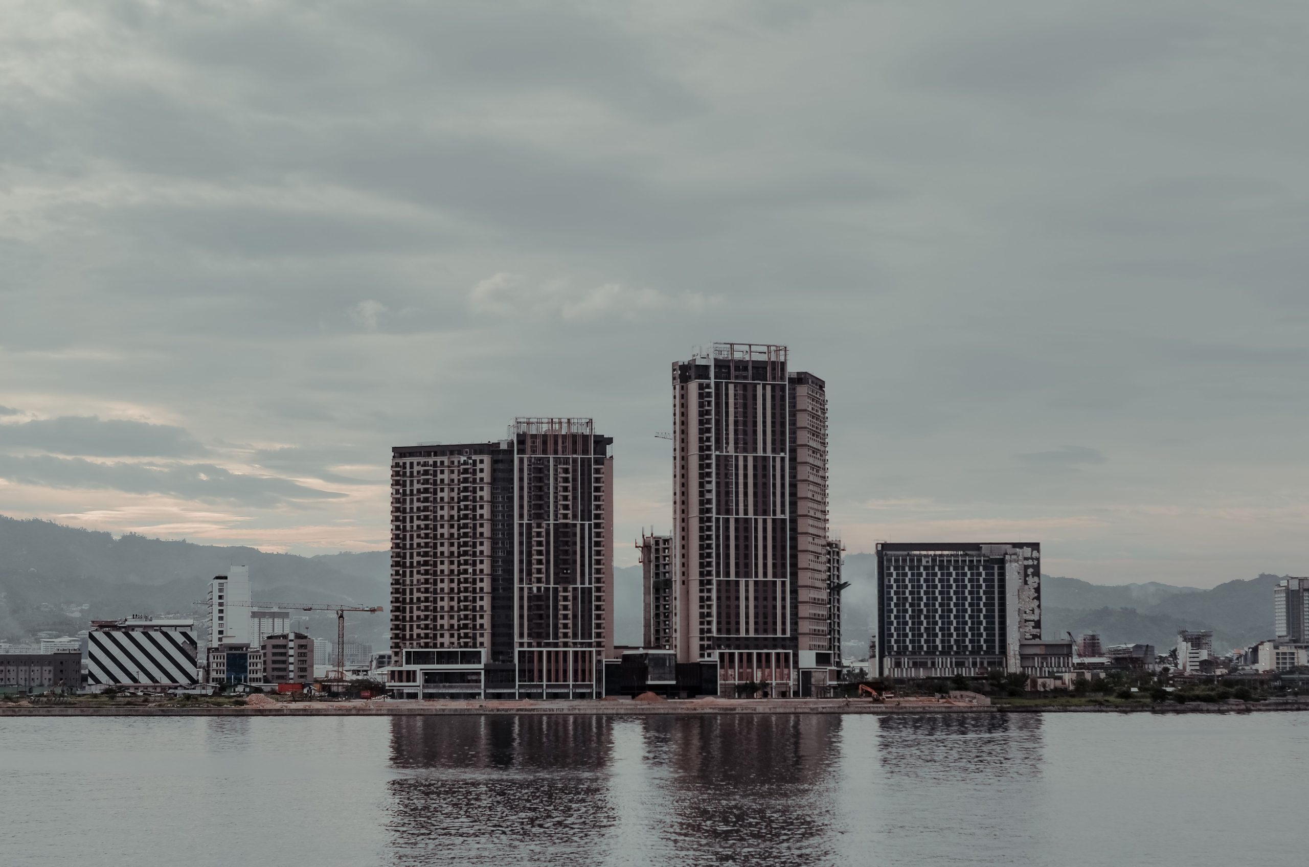 Kota Kinabalu skyline and waterfront in Sabah, Malaysia, representing urban growth and regional development.