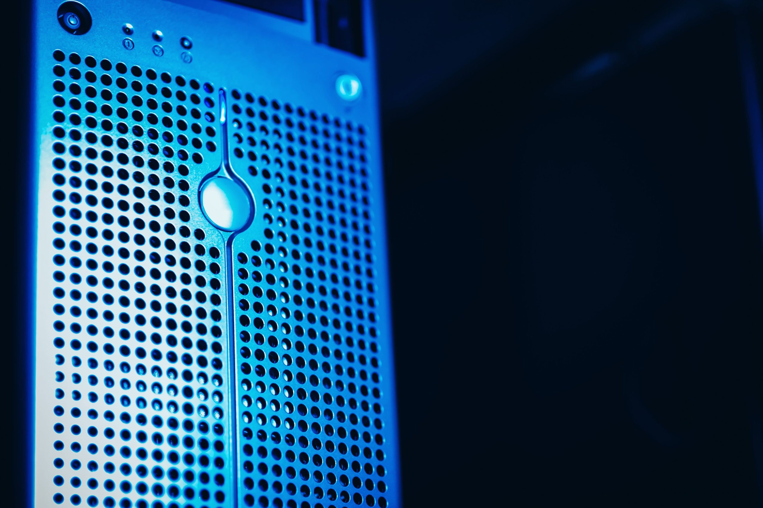 Modern server rack with blue lighting in a secure data center, representing enterprise data protection.